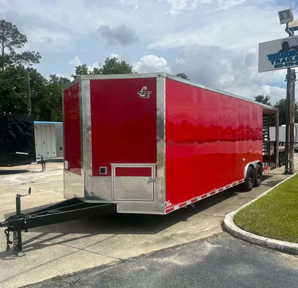 Red enclosed cargo trailer with dual axle for sale at Mississippi trailer dealer